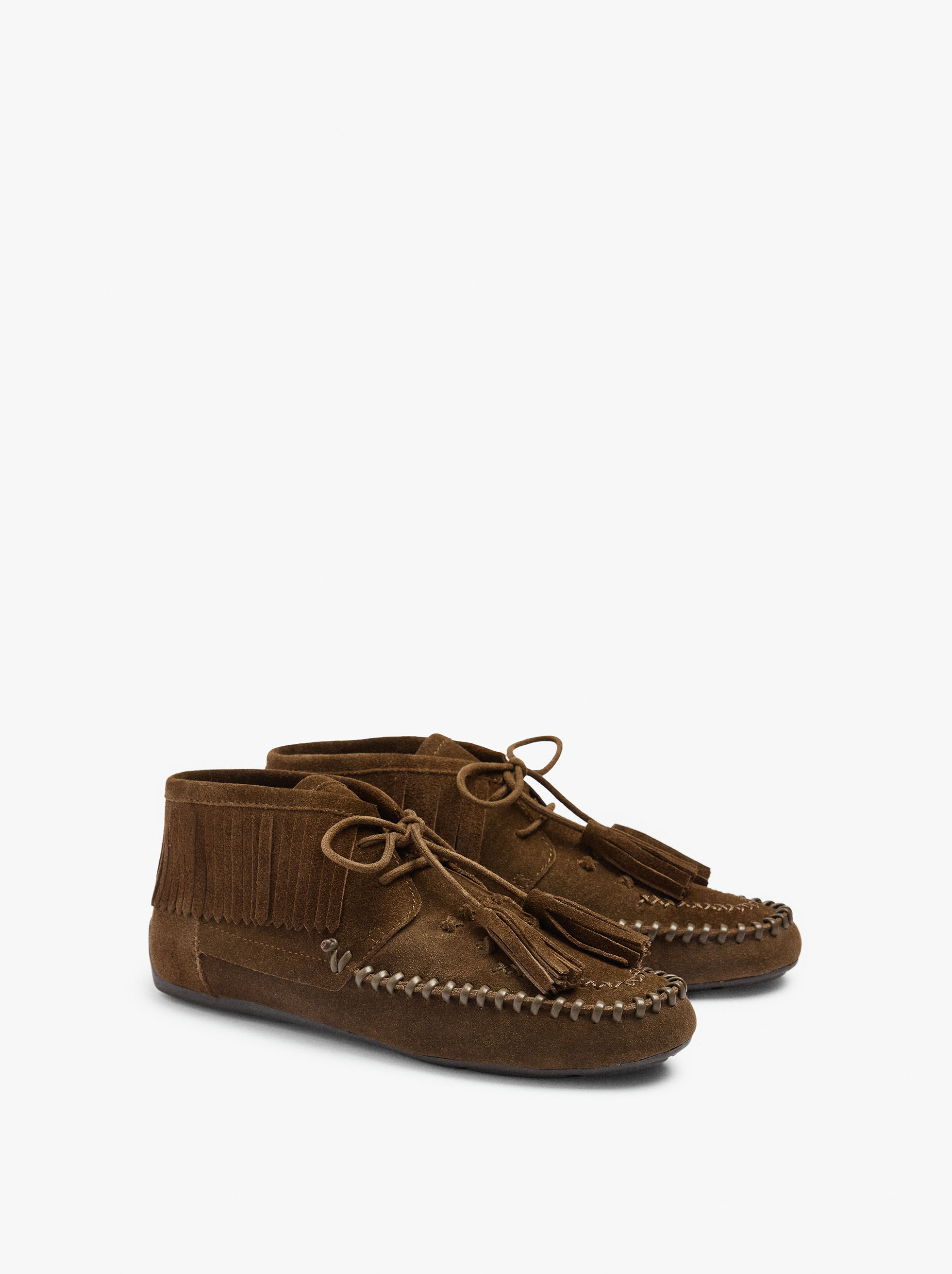 Botines de piel planos con flecos